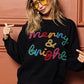 Black Tinsel Lettering “Merry & Bright” Sweater