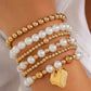 Gold and Pearl White Bracelet Set